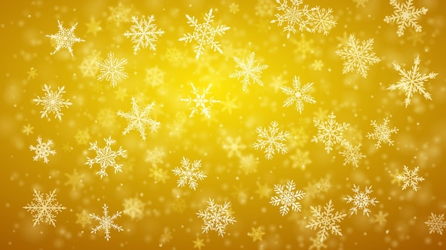 Weihnachtshintergrund von komplexen unscharfen und klar fallenden schneeflocken in gelben farben mit bokeh-effekt