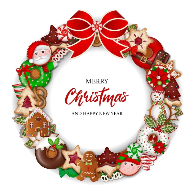 Weihnachtskranz mit Kuchen Bonbons und Keksen