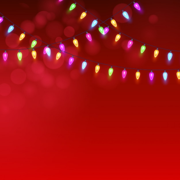Weihnachtsroter hintergrund mit leuchtender girlande, grußkarte