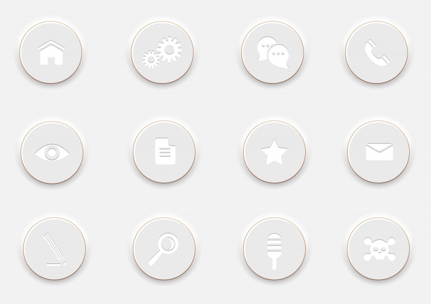 Weiße Computer Ikonen auf runden Knöpfen