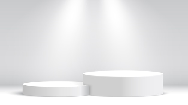 Weißer Messestand. Podium und Scheinwerfer. Bühne für die Preisverleihung. Sockel.