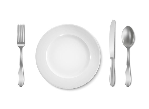 White empty plate with knifefork and spoon