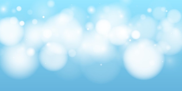 Abstract blue bokeh background with bright glowing circles soft blur effect creates a dreamy festive