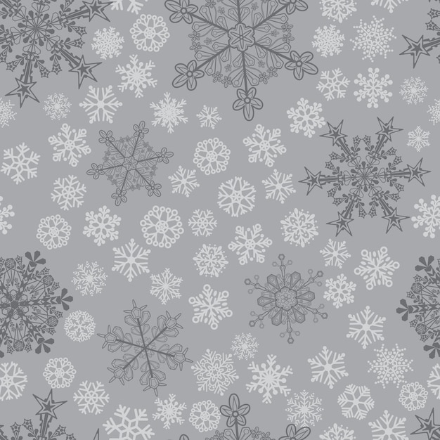 Christmas seamless pattern of big and small snowflakes gray on gray