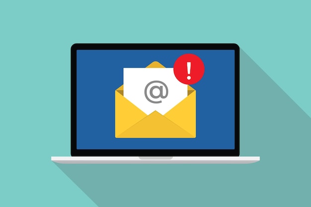 Email spamming attack concept with envelope mail and danger icon on front of laptop computer with modern flat style