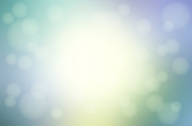 Green blue yellow blurred background with bokeh lights