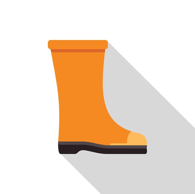 orange rubber boot standing with long shadow