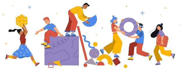 A equipe de pessoas montou grandes peças abstratas geométricas