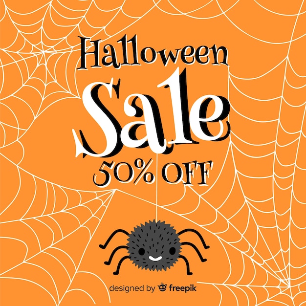 Vetor grátis aranha e venda de halloween de teia de aranha
