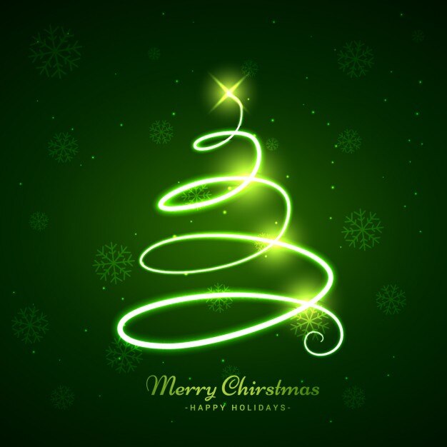 Vetor grátis árvore de natal de incandescência em fundo verde