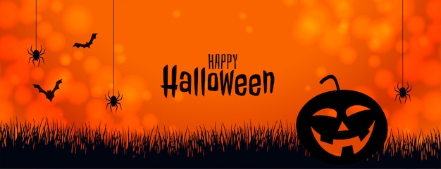 Vetor grátis banner de halloween laranja com abóbora aranha e morcegos