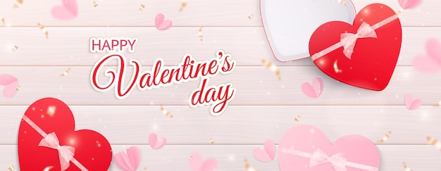 Vetor grátis banner horizontal de corações de dia dos namorados com texto ornamentado e caixas de presente e coração realistas