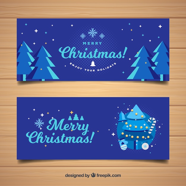 Vetor grátis banners de natal com árvores em tons azuis