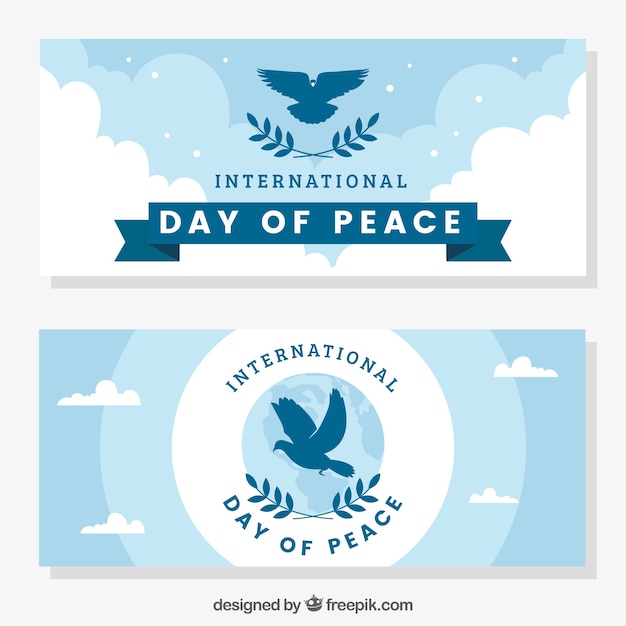 Banners do dia da paz com silhueta dos pombos