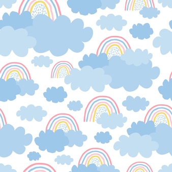 Bonito, delicado padrão sem costura com um arco-íris, nuvens em um fundo branco em cor pastel. ilustração para design de quarto infantil, papel de parede, têxteis, tecido, papel de embalagem. vetor