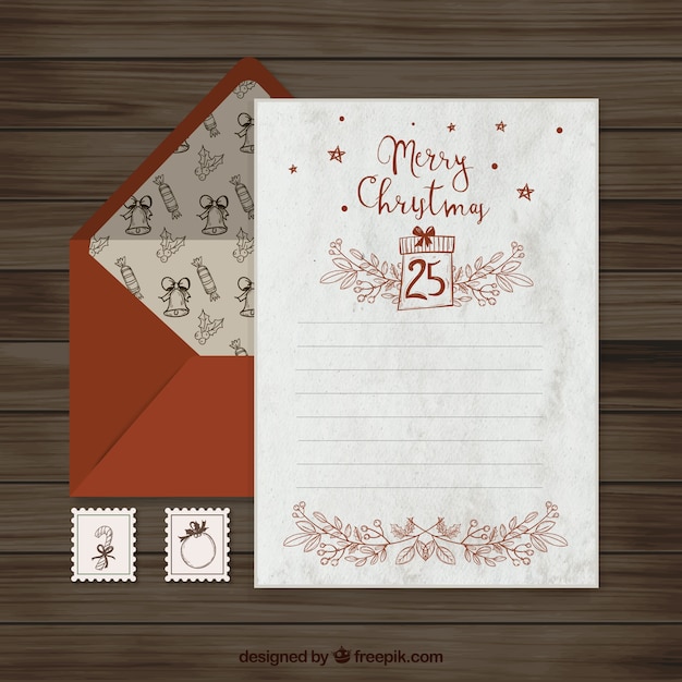 Vetor grátis carta de feliz natal com envelope vermelho e selos