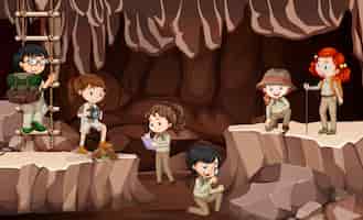 Vetor grátis cena com grupo de escoteiros explorando a caverna