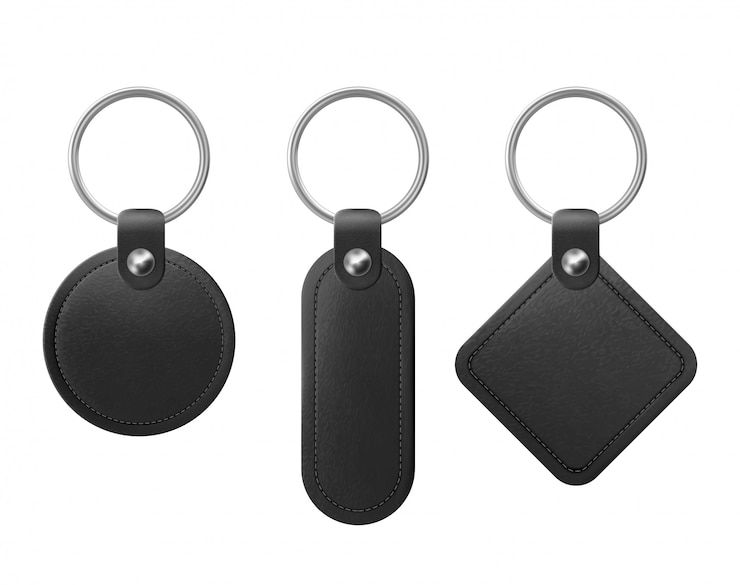 Vetor grátis chaveiro de couro preto de vetor com anel de metal