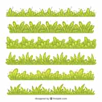 Vetor grátis coleção desenhado mão de fronteira grama em tons verdes