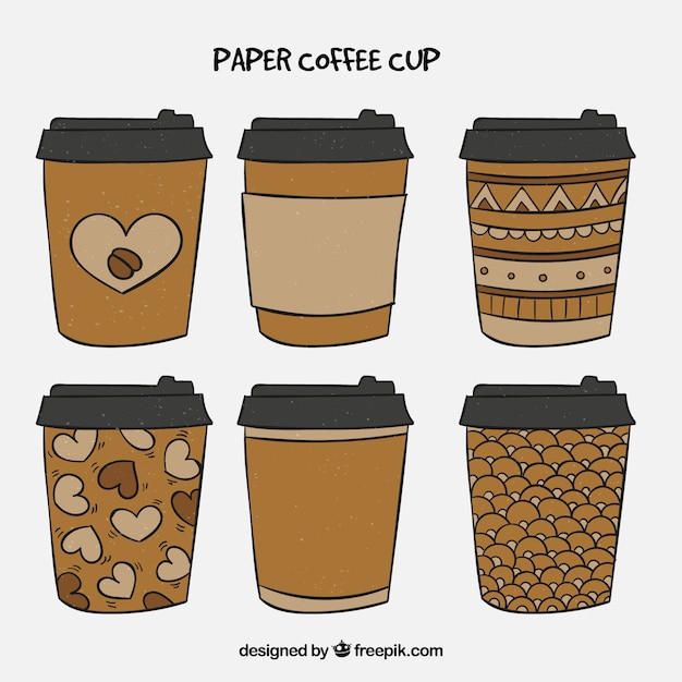 Vetor grátis copo de café em papel desenhado a mão