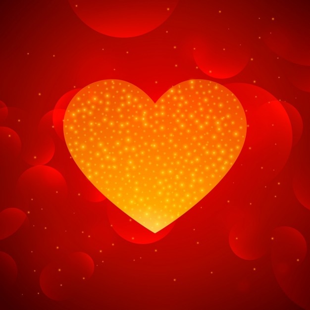 Vetor grátis coração de ouro sobre fundo vermelho do bokeh