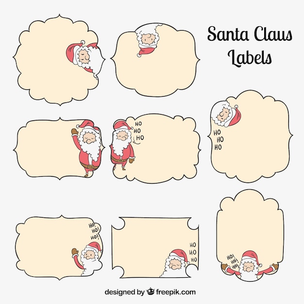 Vetor grátis desenhadas mão etiquetas de papai noel