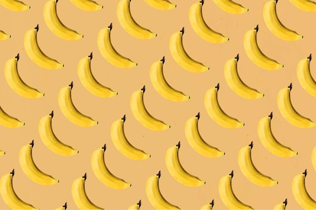 Vetor grátis desenhado à mão com fundo estampado de banana fresca natural