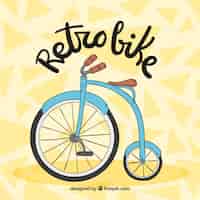 Vetor grátis desenho desenhado de fundo retro da bicicleta