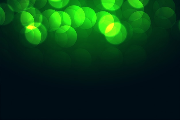 Vetor grátis design de efeito atraente luzes verdes bokeh