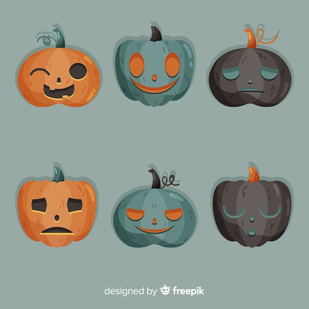 Vetor grátis design plano de abóboras assustadoras de halloween