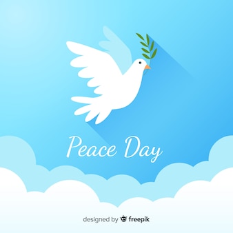 Dia da paz composição com pomba branca plana