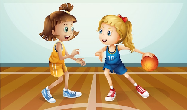 Duas jovens senhoras jogando basquete