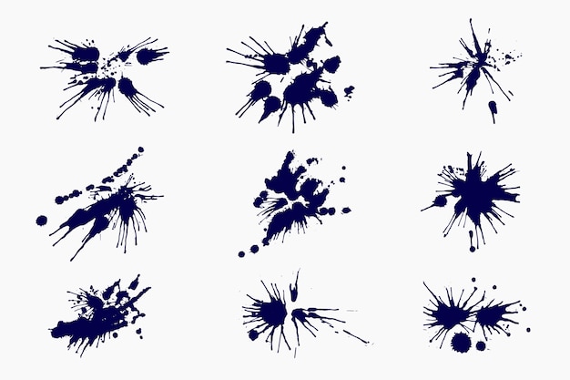 Vetor grátis elementos de respingos de tinta de design plano