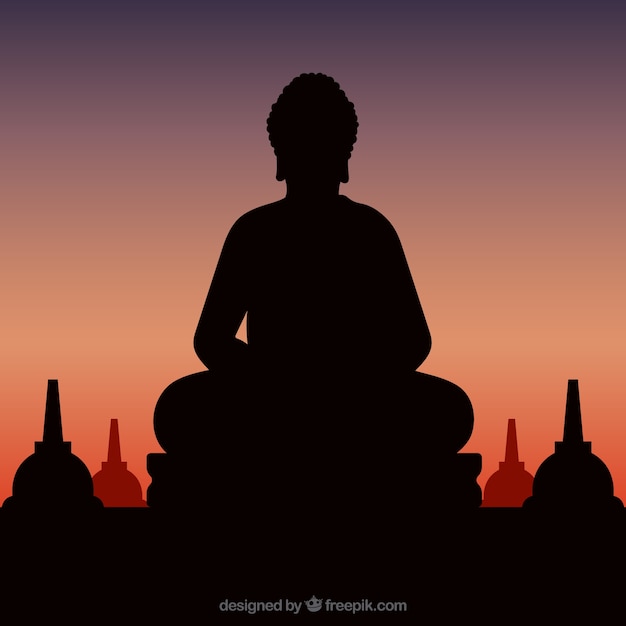 Estátua de Buda silhueta com pôr do sol