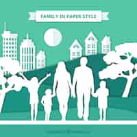 Vetor grátis família feliz no estilo de arte de papel