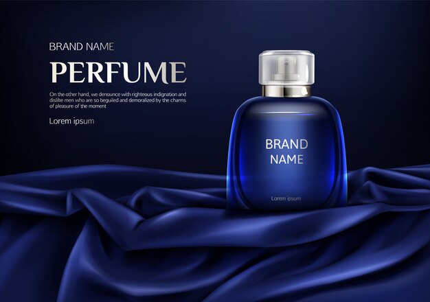 Frasco de vidro de perfume em tecido dobrado seda azul