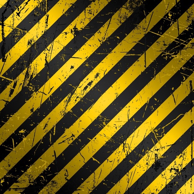 Vetor grátis fundo da construção de grunge textured em amarelo e preto