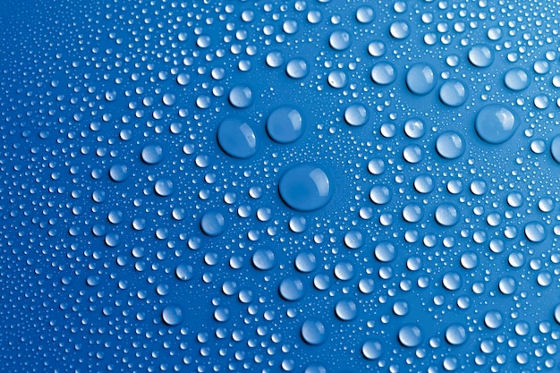 Fundo de textura de gota de água, vetor de papel de parede azul