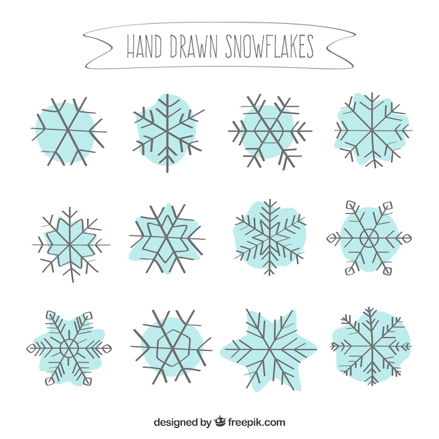 Vetor grátis hand drawn coleção dos flocos de neve