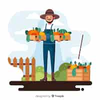 Vetor grátis homem agrícola com cestas cheias de vegetais