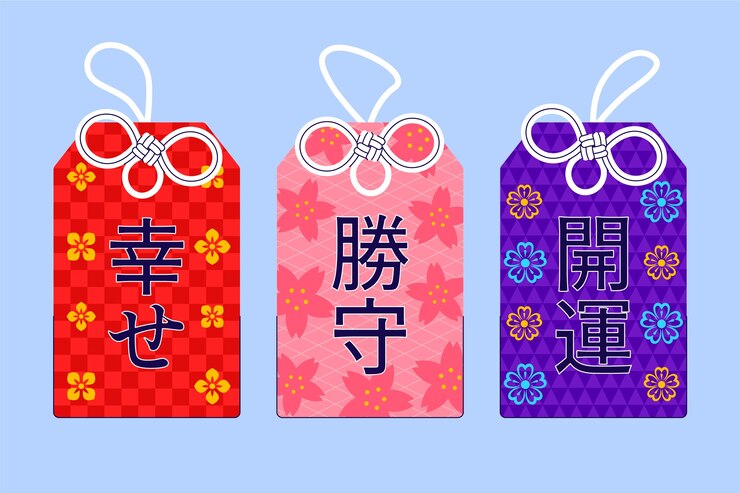 Vetor grátis ilustração de amuletos japoneses desenhados à mão