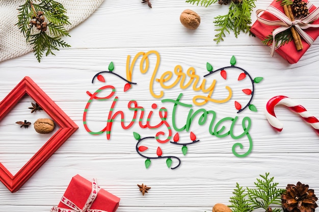 Letras de feliz Natal com moldura e presentes