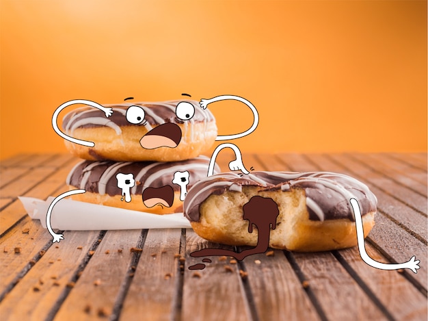 Mão desenhada donuts de chocolate com medo