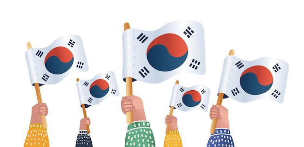 Mãos segurando bandeiras da coreia do sul coreia do sul