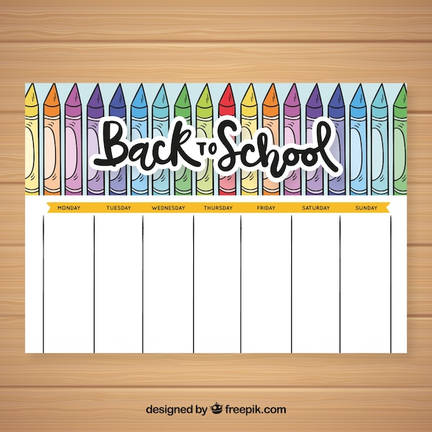 Vetor grátis modelo de calendário de escola desenhada de mão