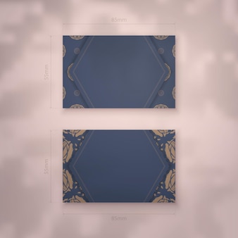 Modelo de cartão de negócios de cor azul com padrão marrom grego para seus contatos.