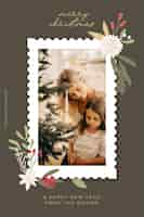 Vetor grátis modelo de cartão de saudação de feliz natal com foto de família e decoração floral