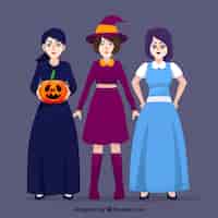 Vetor grátis mulheres disfarçadas no halloween