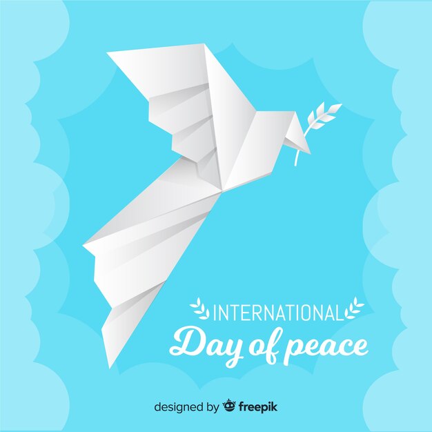 Origami mergulhou para o dia da paz com folha de oliveira