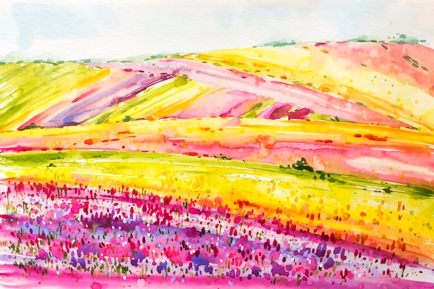 Vetor grátis paisagem de primavera em aquarela com campos de flores coloridas